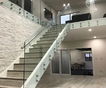 Sleek Standoff Glass Railing for and Secure Barriers with a Modern Minimalist Design