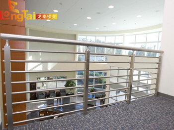 Stainless steel railing with pipes threaded through