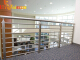 Stainless steel railing with pipes threaded through