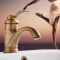 Cold and hot water faucets in the bathroom; washbasin faucets on the vanity surface.