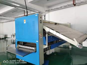 Bed sheet folding machine