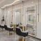 Minimalist single-sided salon mirror with integrated beauty lighting—designed specifically for hair salons.