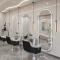 Minimalist single-sided salon mirror with integrated beauty lighting—designed specifically for hair salons.