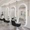 Minimalist single-sided salon mirror with integrated beauty lighting—designed specifically for hair salons.