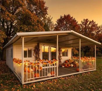 Single-Story Prefab Vacation Cabin With Full Covered Veranda
